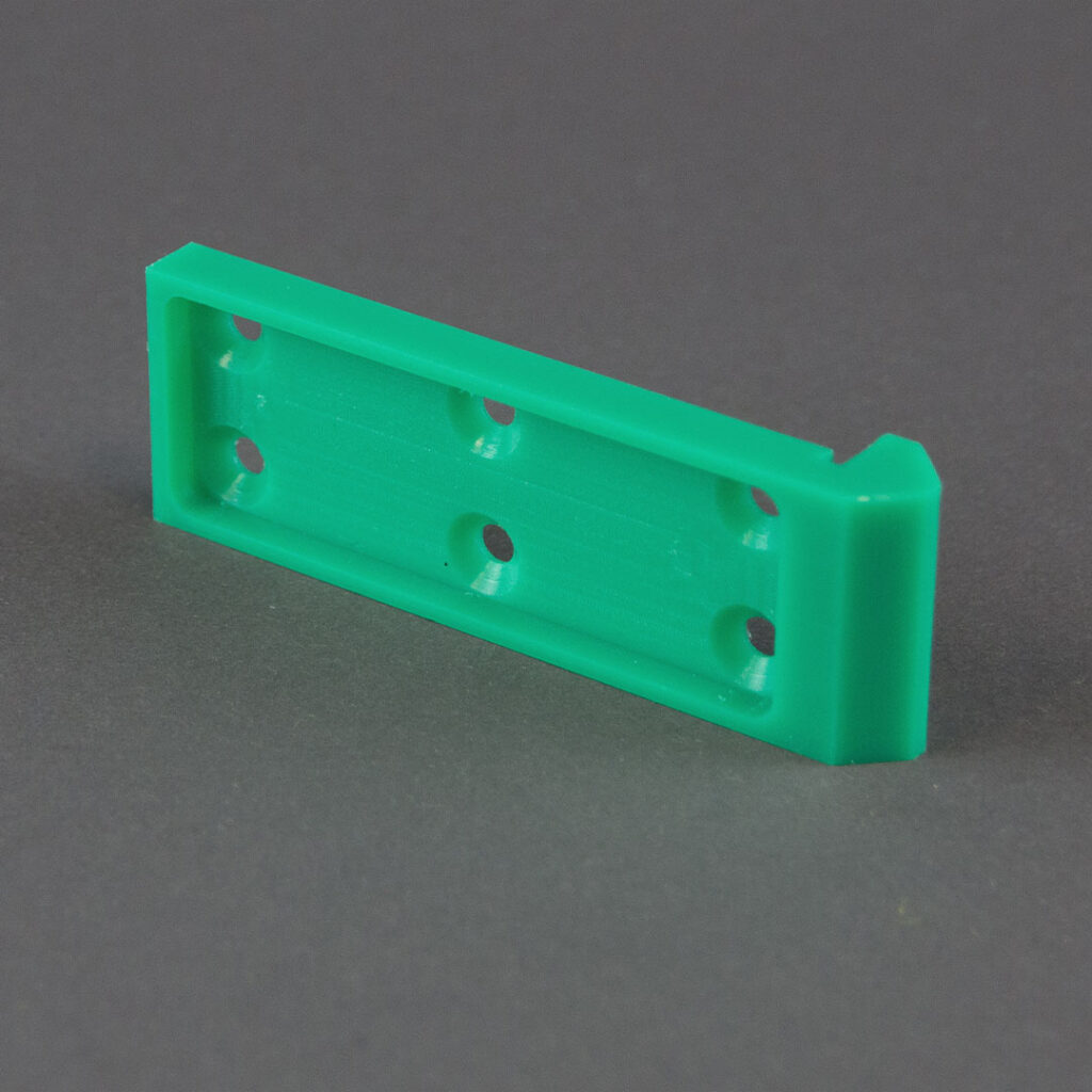 grünes gefrästes PE Bauteil
